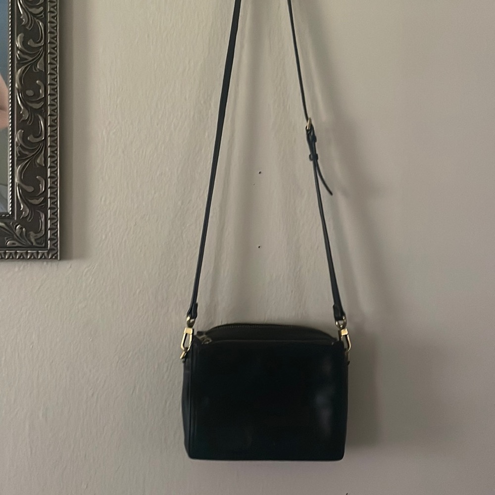 Fossil black purse with adjustable length strap